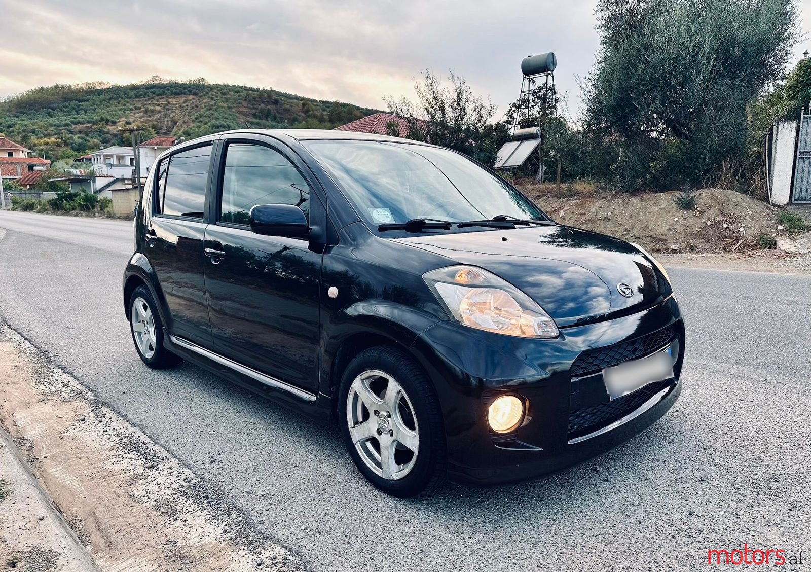 2006' Daihatsu Sirion photo #1