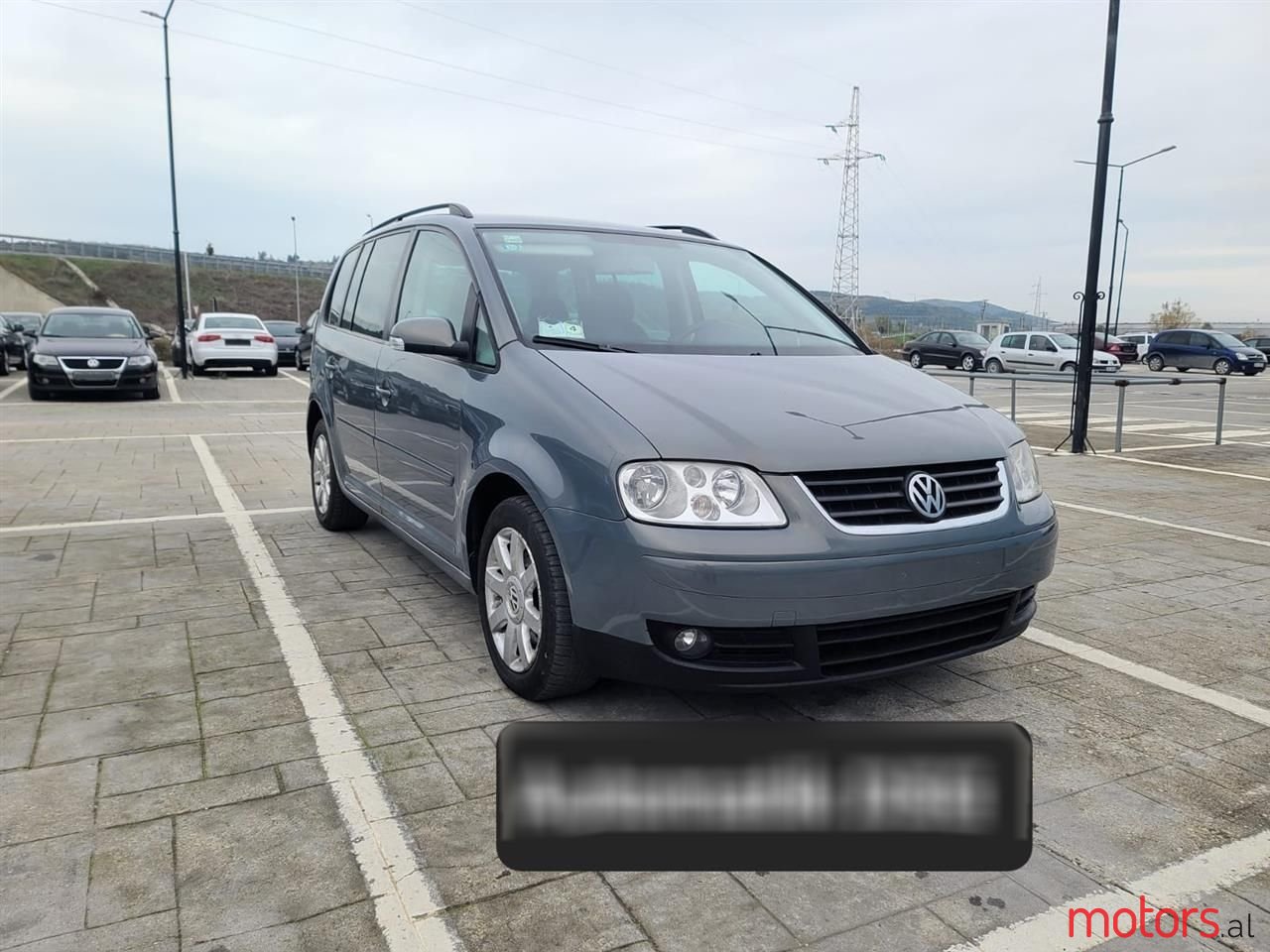2006' Volkswagen Touran photo #1
