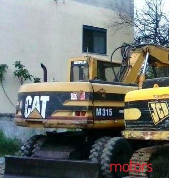 2010' Cat M315 photo #2