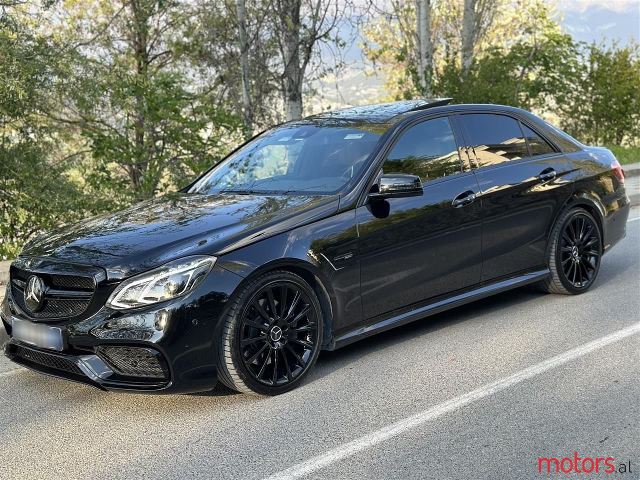 2011' Mercedes-Benz E 55 AMG photo #1