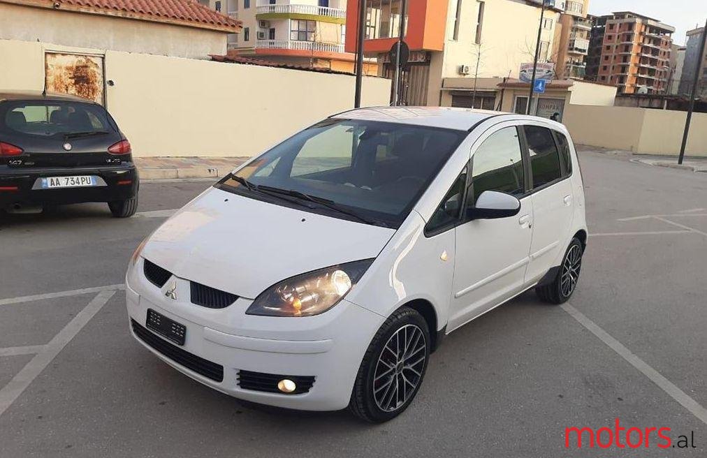 2009' Mitsubishi Colt photo #1