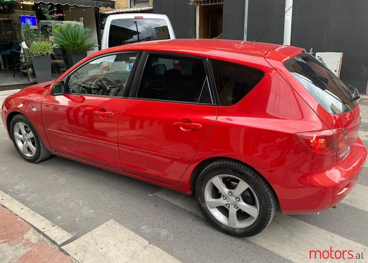 2004' Mazda 3 photo #1