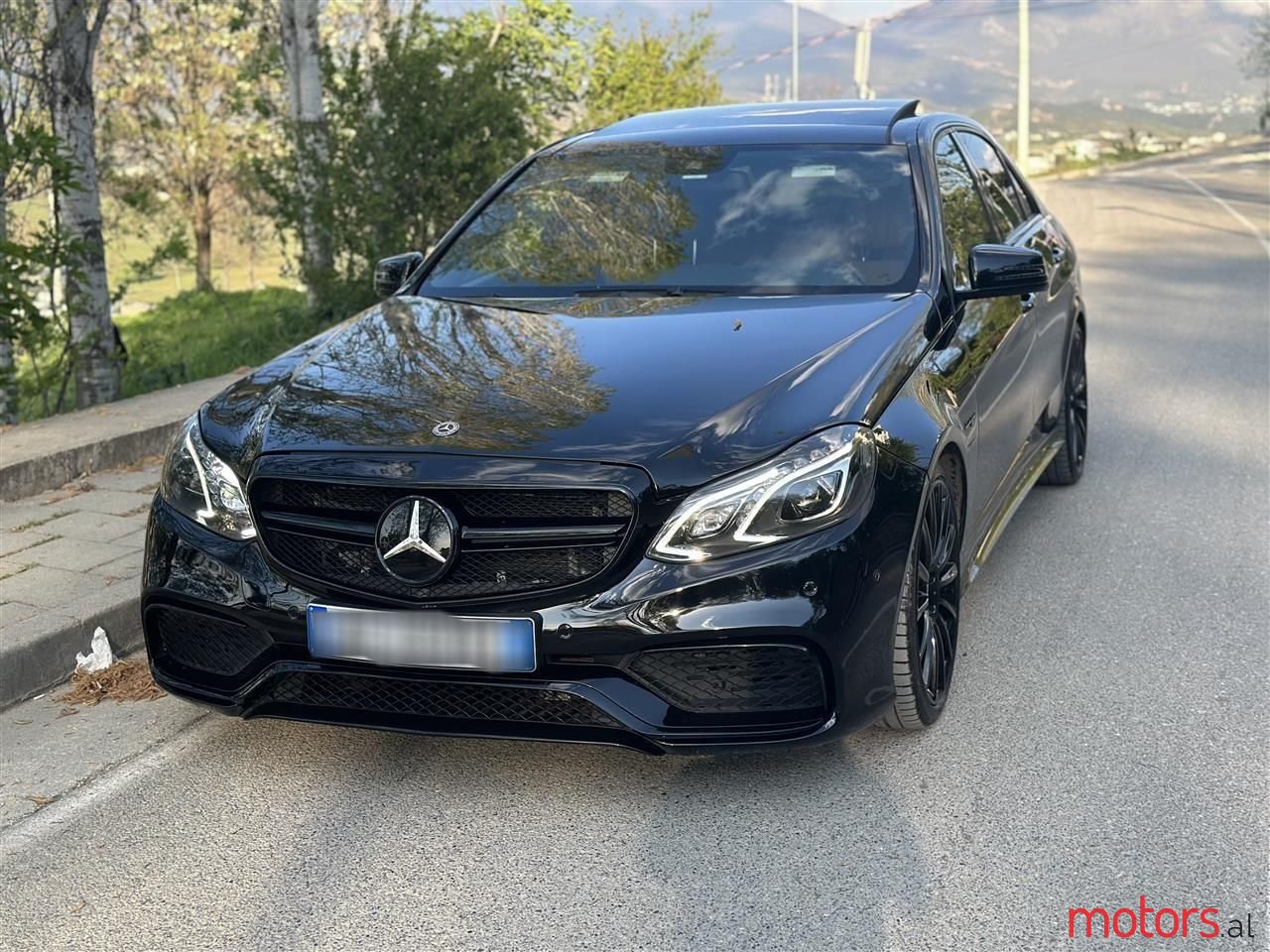 2011' Mercedes-Benz E 55 AMG photo #5