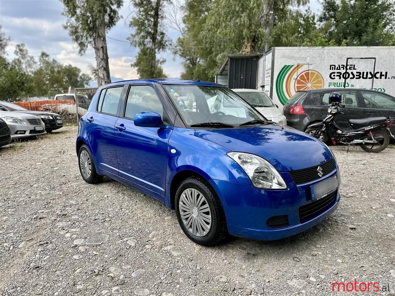 2006' Suzuki Swift photo #1