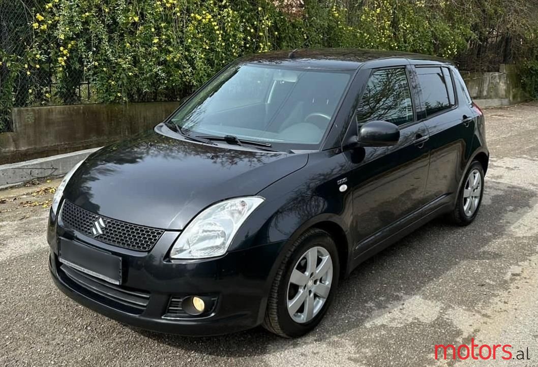 2009' Suzuki Swift photo #3