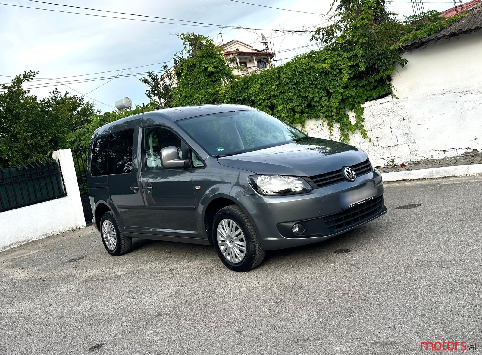 2011' Volkswagen Caddy photo #1