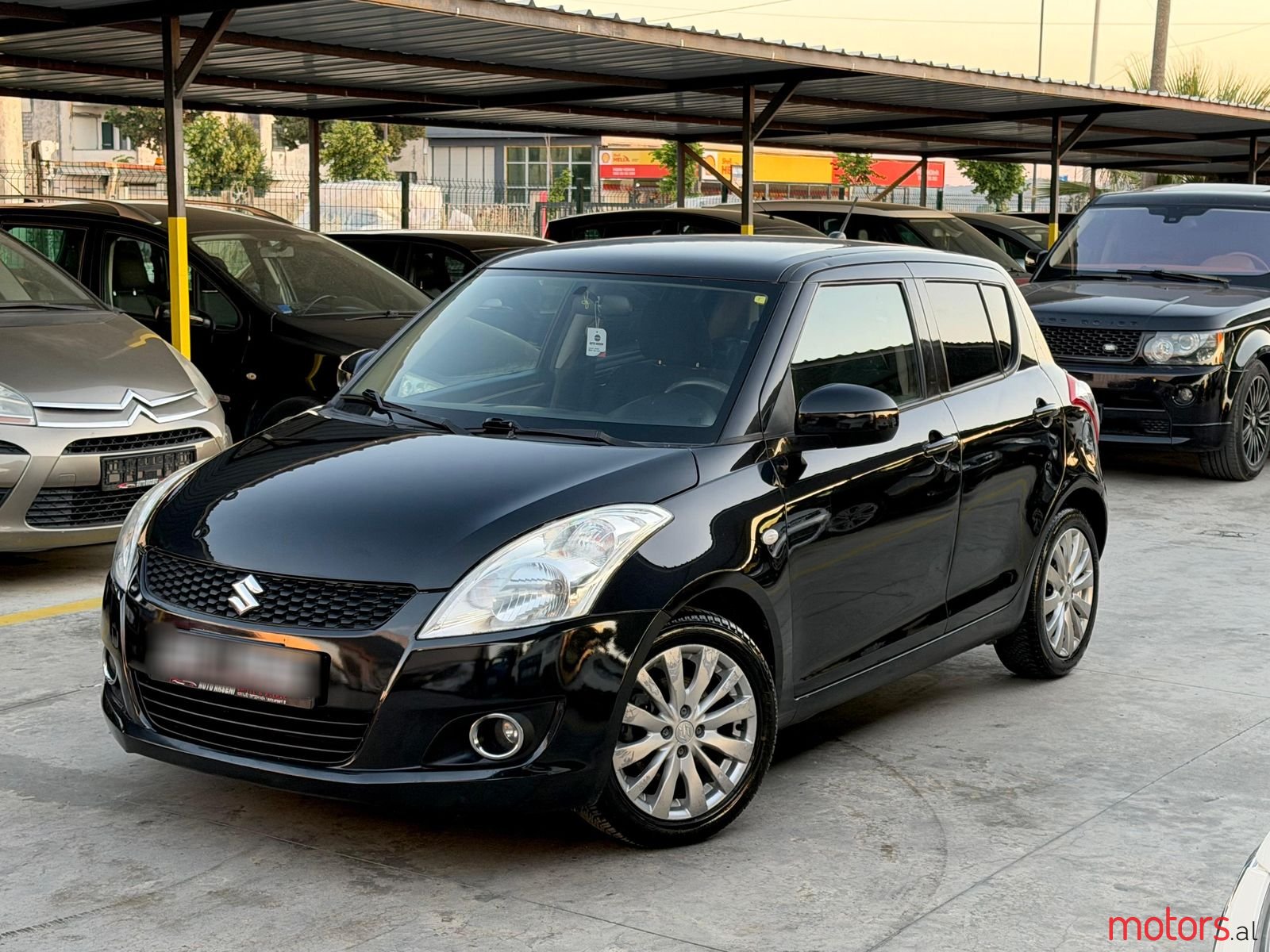 2012' Suzuki Swift photo #1