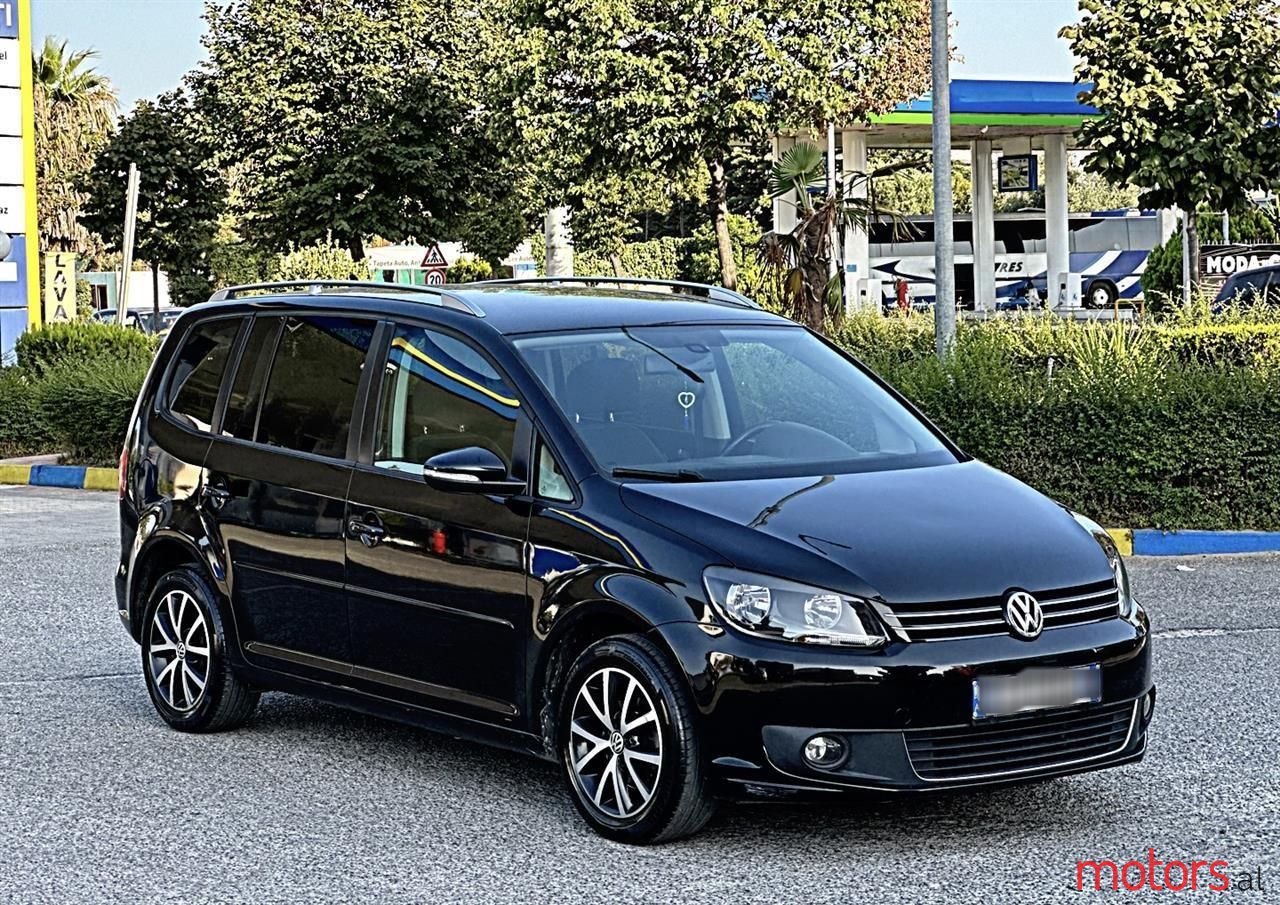 2014' Volkswagen Touran photo #1