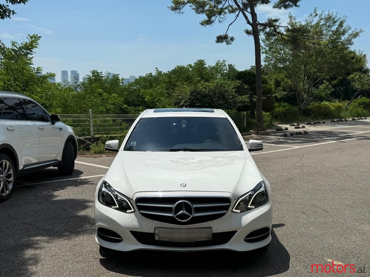 2015' Mercedes-Benz E 220 photo #1