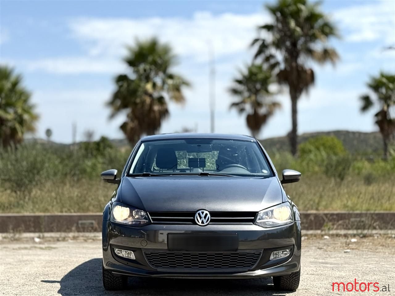 2011' Volkswagen Polo photo #1