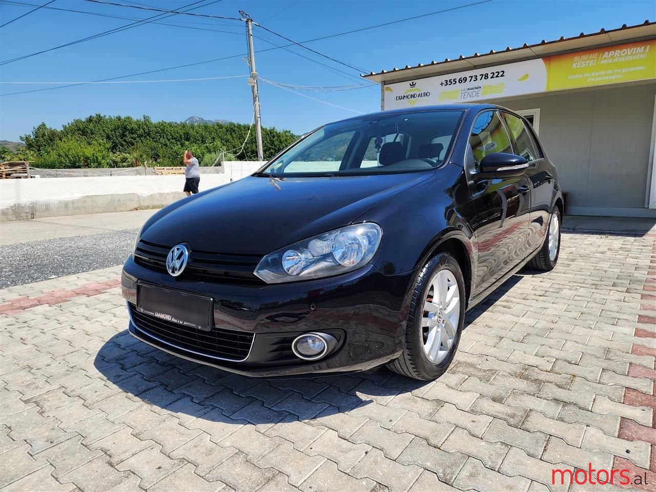 2011' Volkswagen Golf photo #1