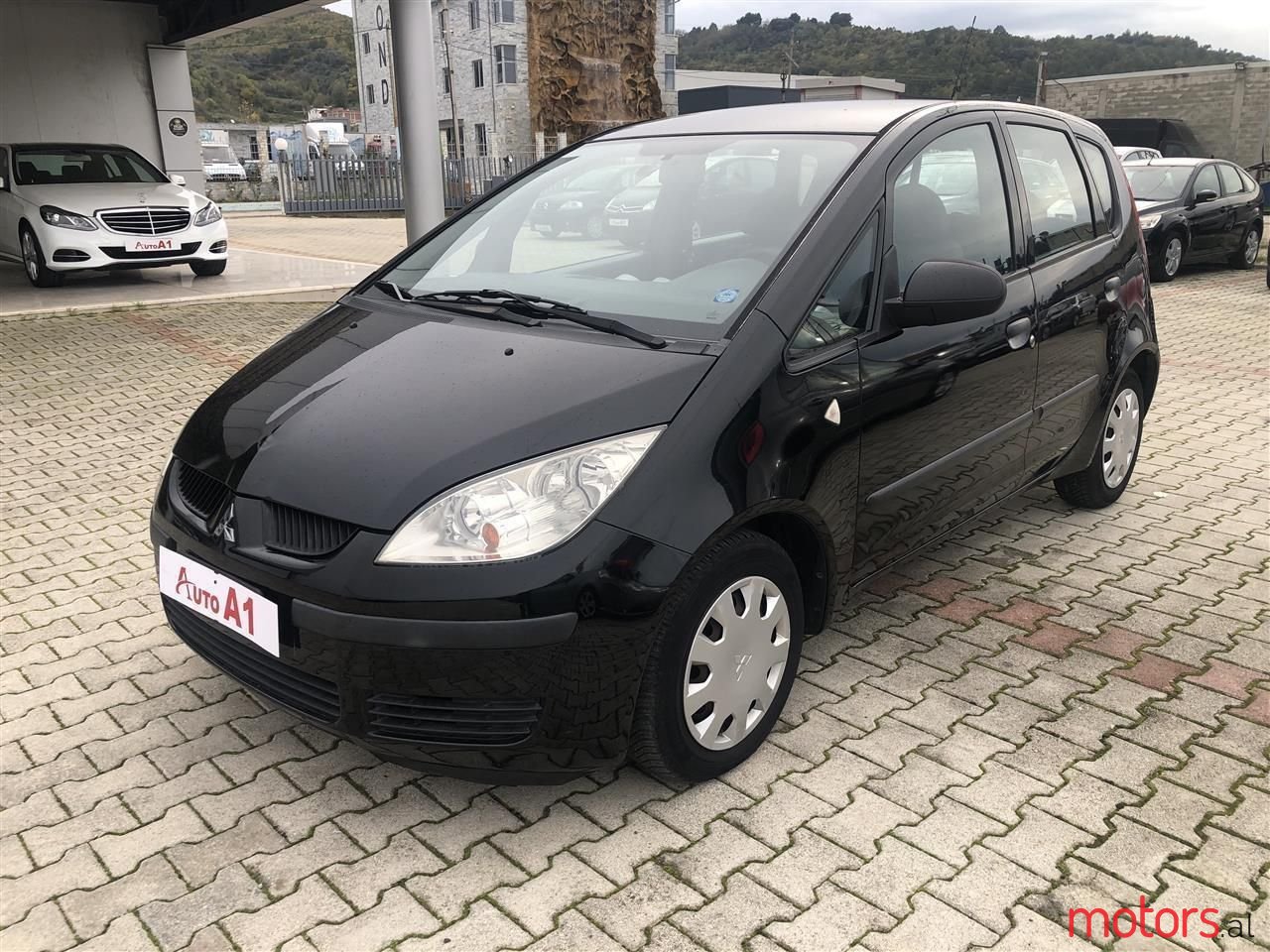 2007' Mitsubishi Colt photo #1