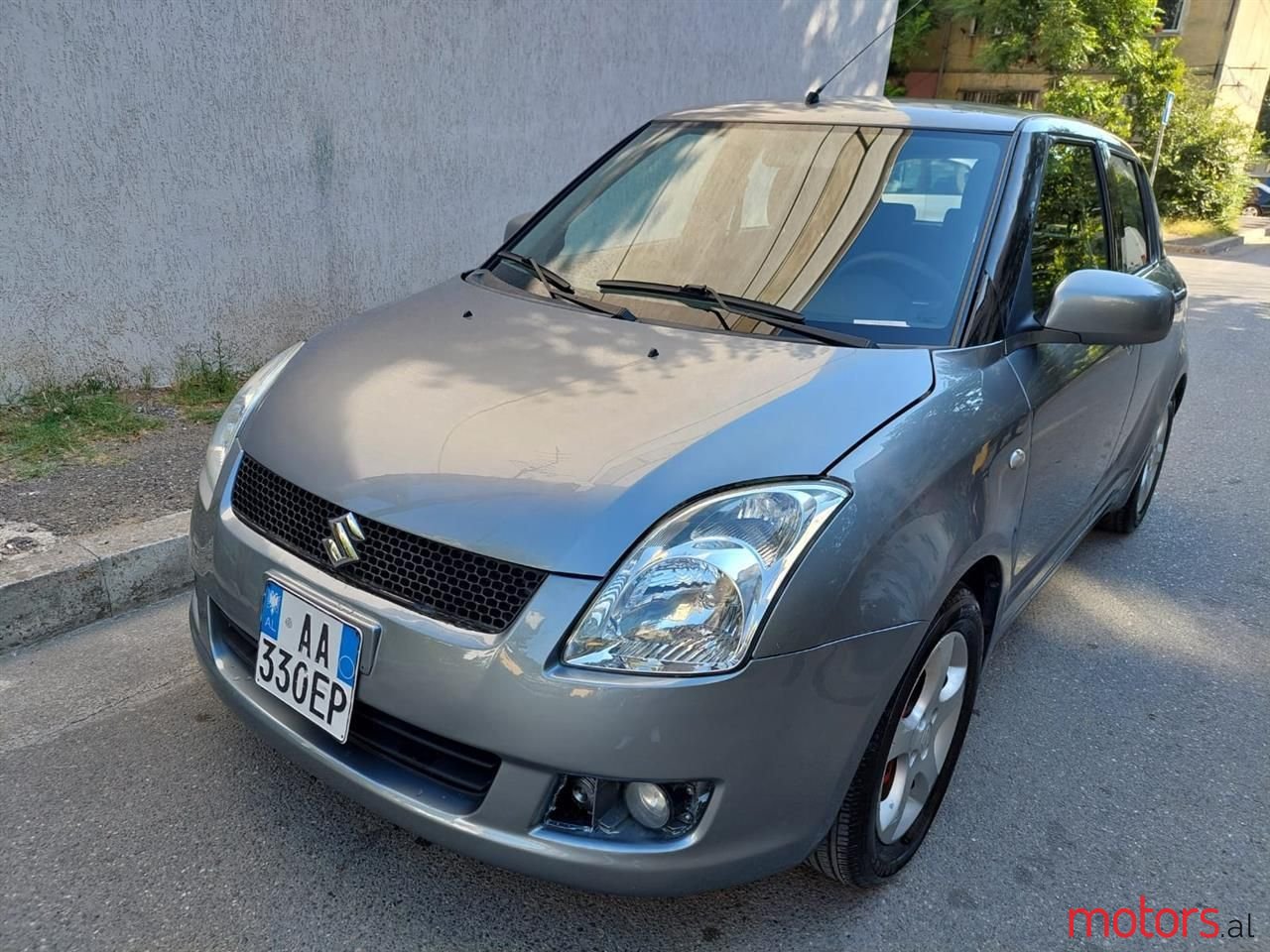 2005' Suzuki Swift photo #1