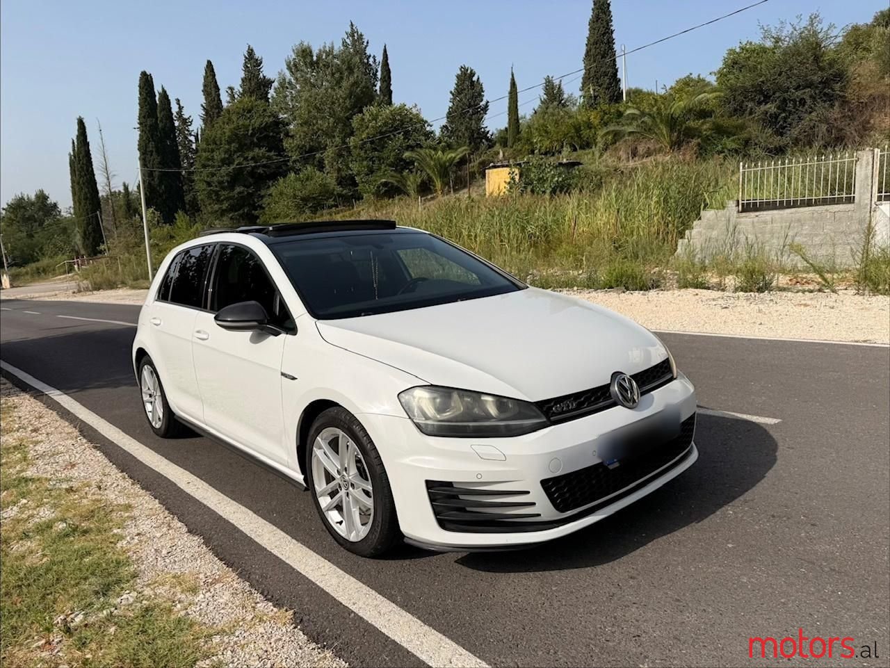 2014' Volkswagen Golf photo #1