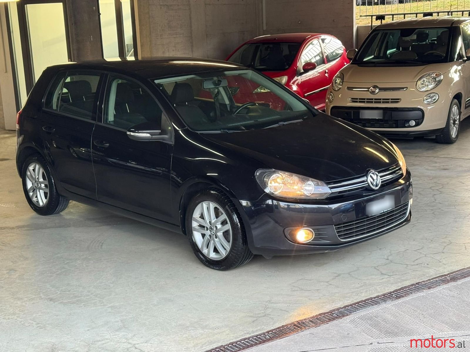 2011' Volkswagen Golf photo #1