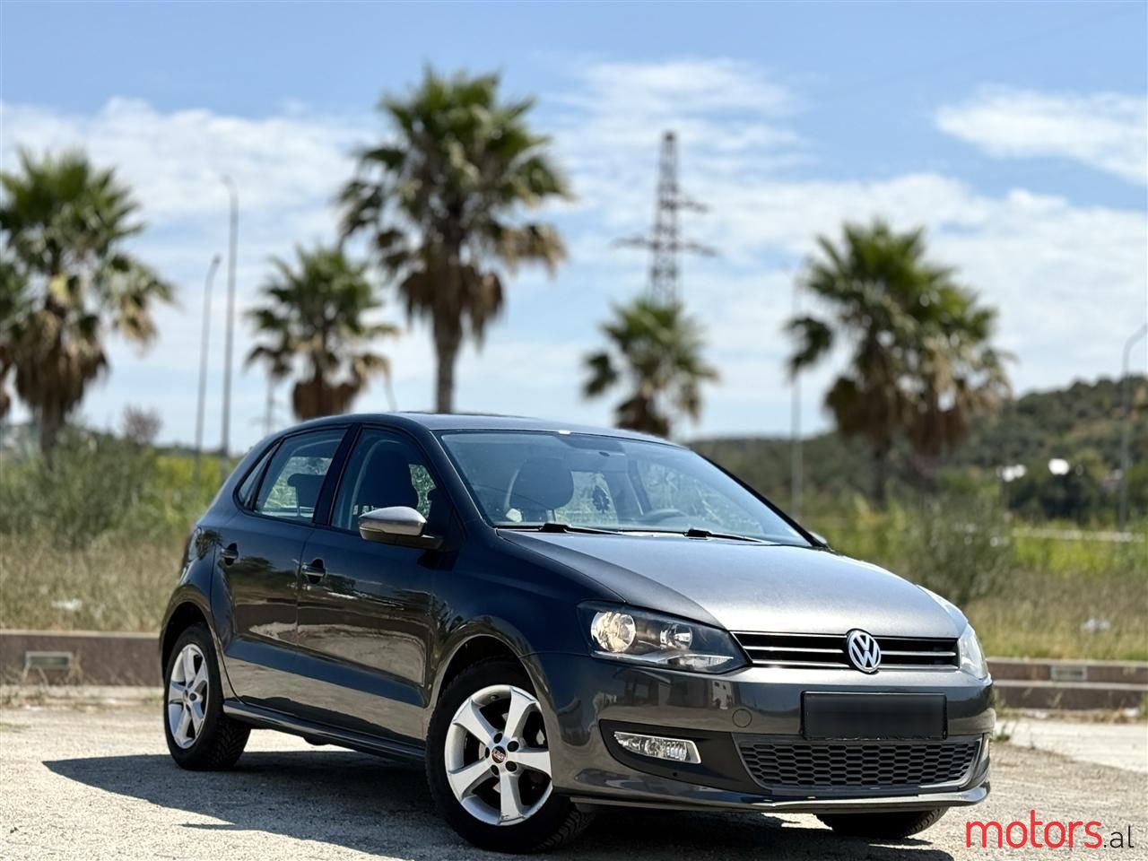 2011' Volkswagen Polo photo #1