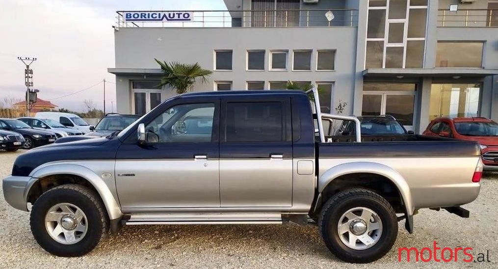 2004' Mitsubishi L200 photo #2