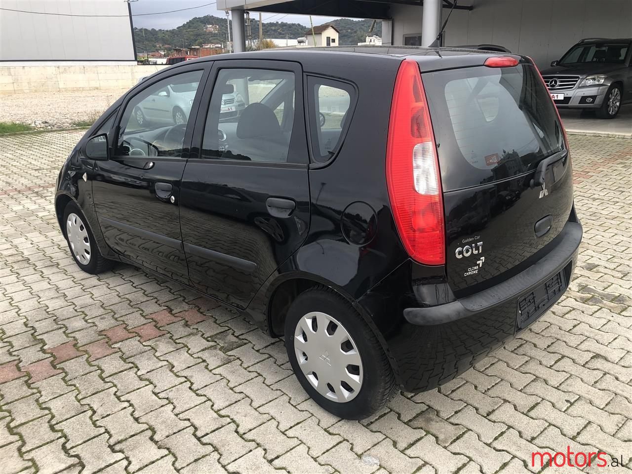 2007' Mitsubishi Colt photo #2