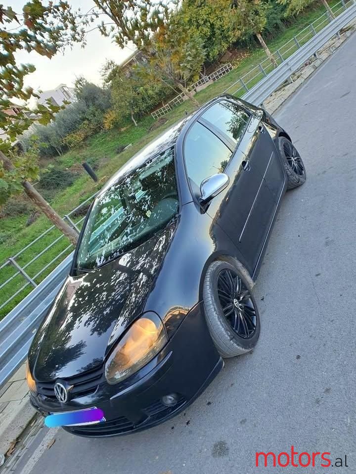 2004' Volkswagen Golf photo #1