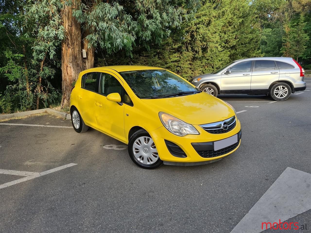 2011' Opel Corsa photo #1
