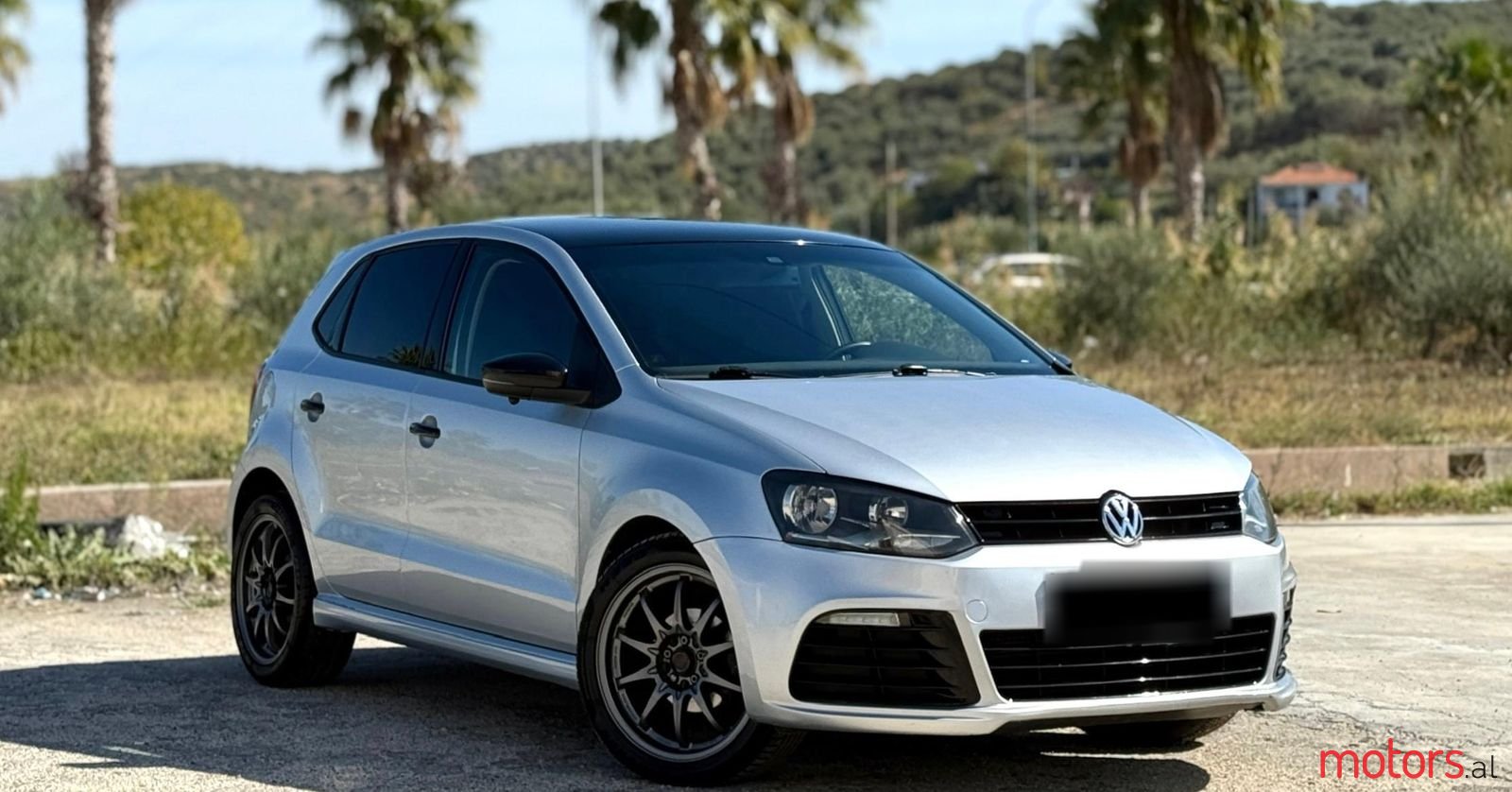 2014' Volkswagen Polo photo #1