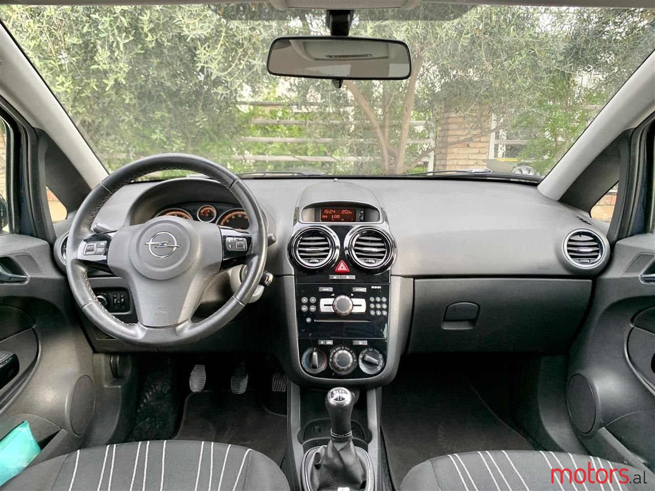 2011' Opel Corsa photo #2