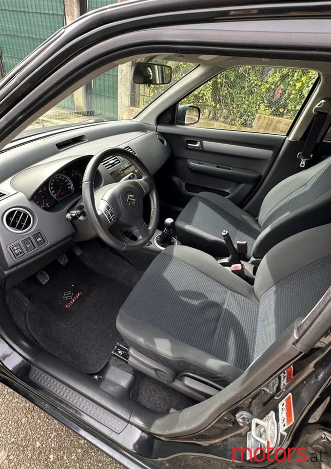 2009' Suzuki Swift photo #4