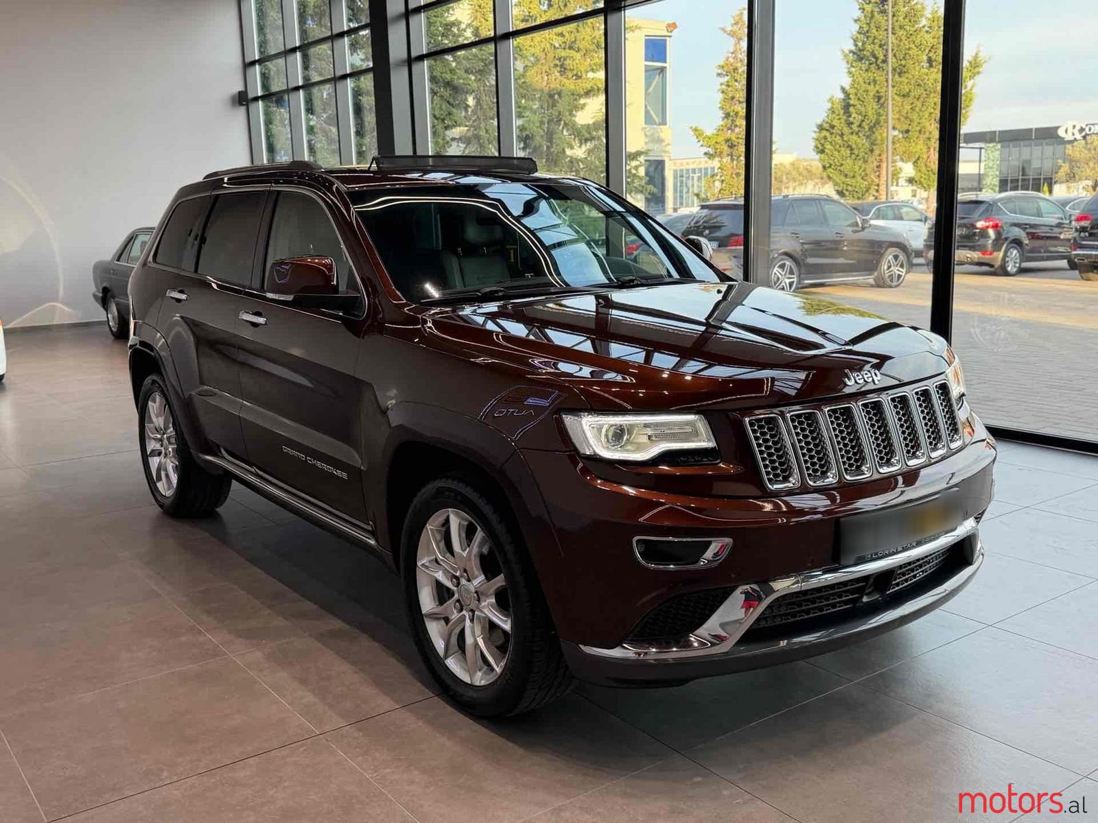 2014' Jeep Grand Cherokee photo #2