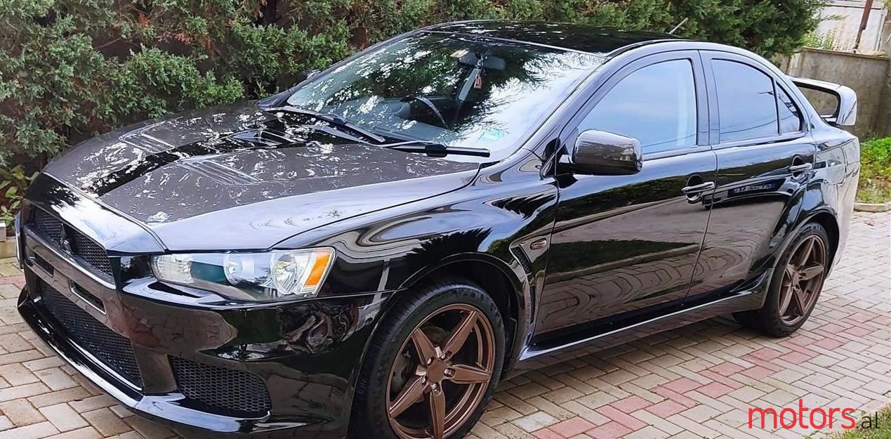 2011' Mitsubishi Lancer photo #1