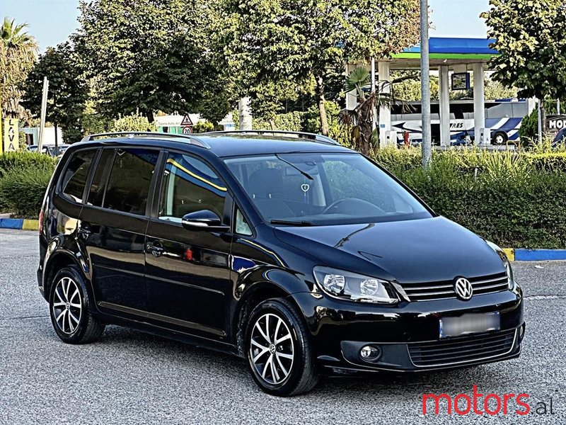 2014' Volkswagen Touran photo #1