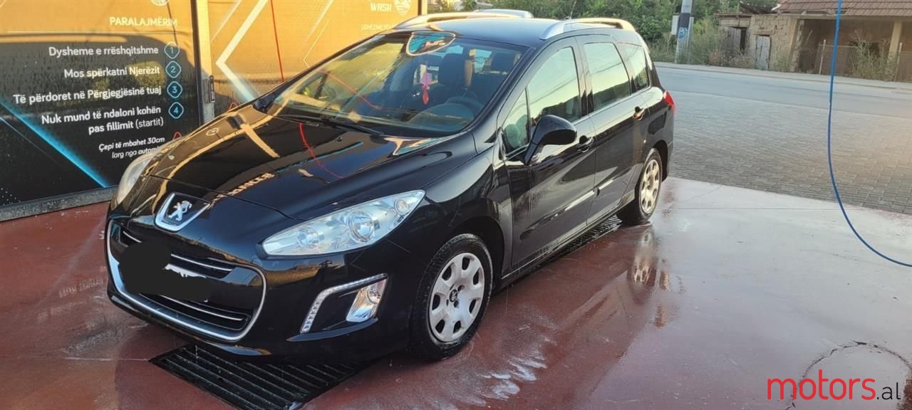 2012' Peugeot 308 photo #1