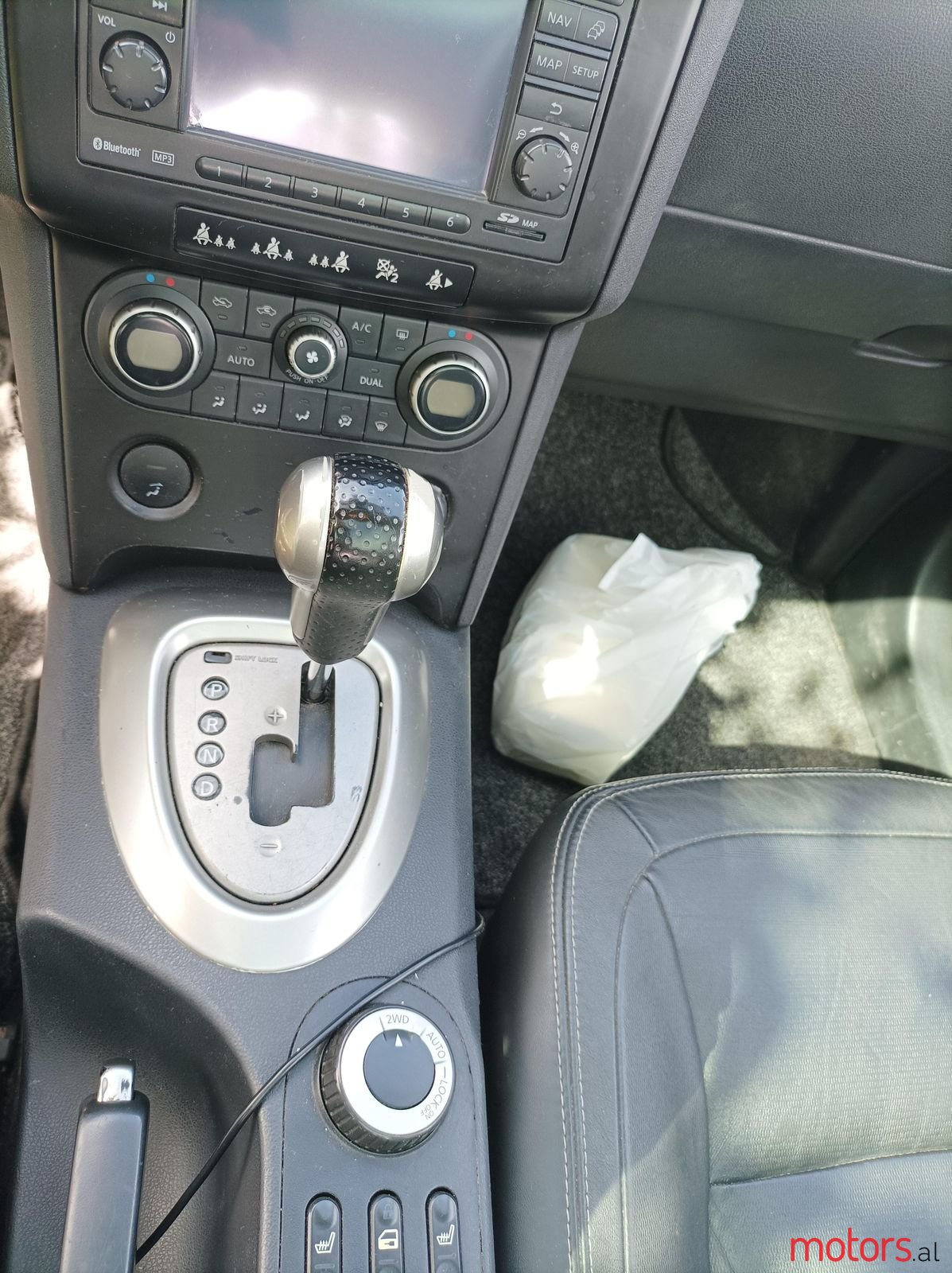 2009' Nissan Qashqai+2 photo #2