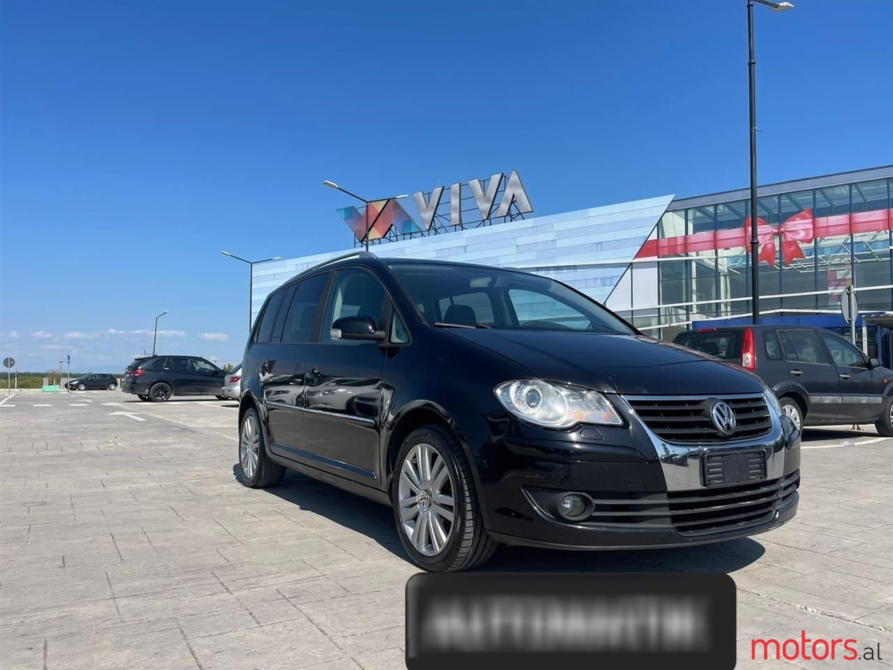 2007' Volkswagen Touran photo #1