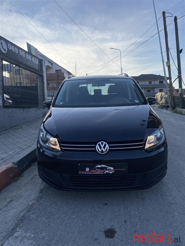 2012' Volkswagen Touran photo #1