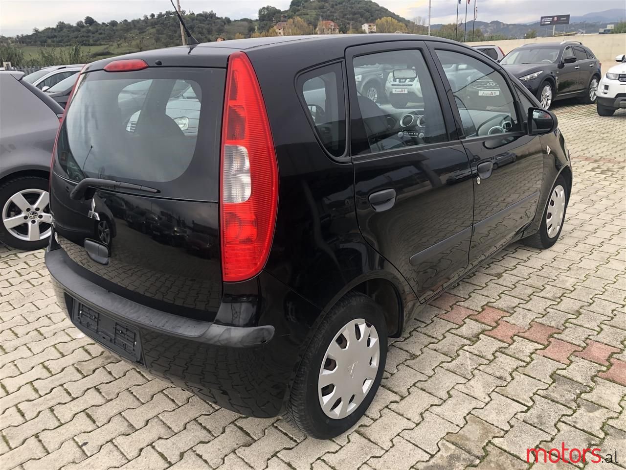 2007' Mitsubishi Colt photo #3