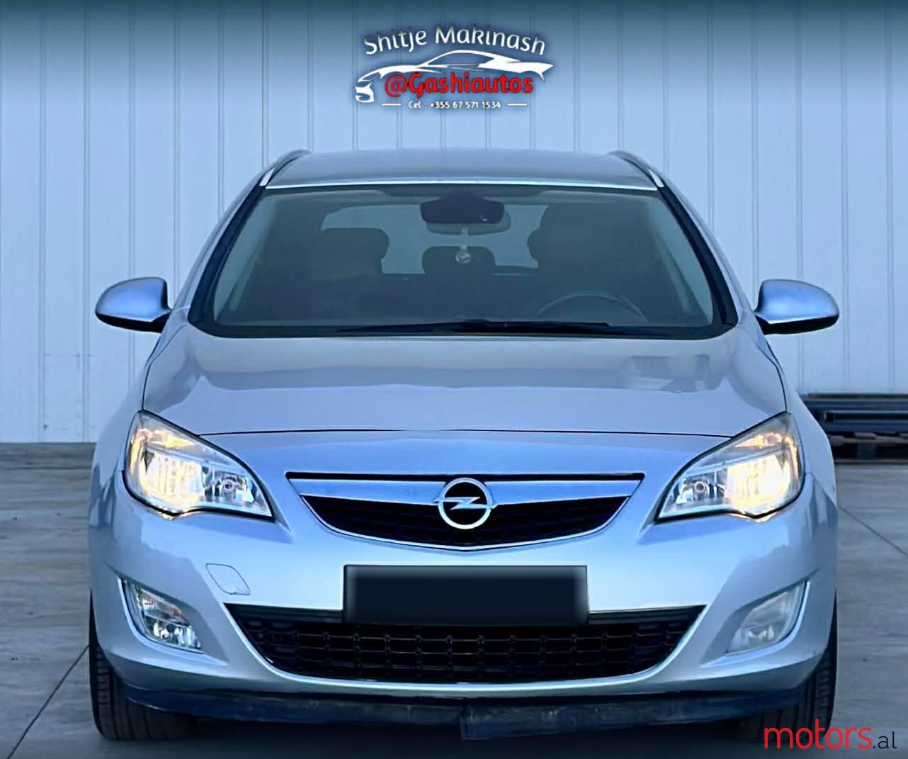 2012' Opel Astra photo #2