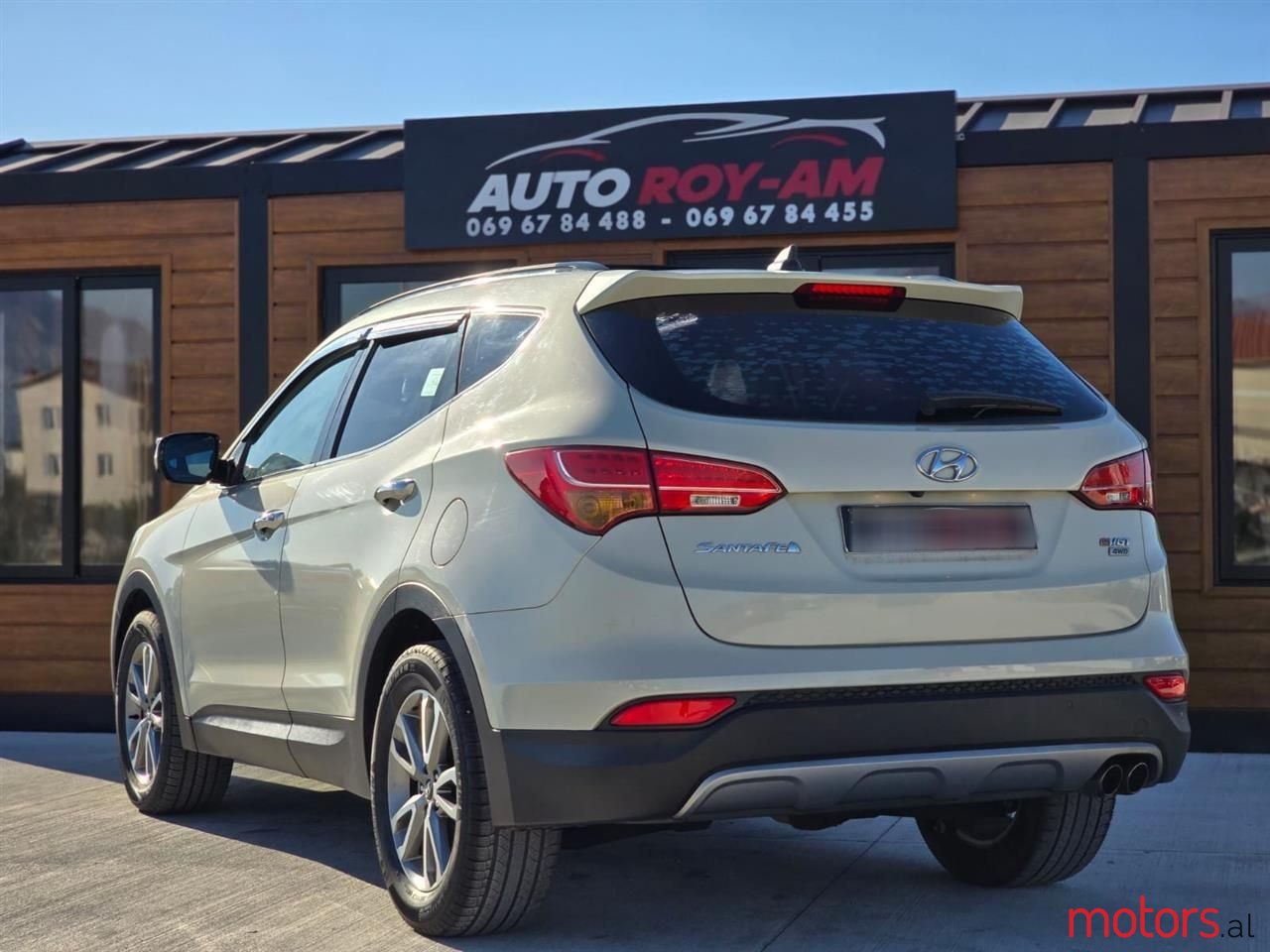 2012' Hyundai Santa Fe photo #3