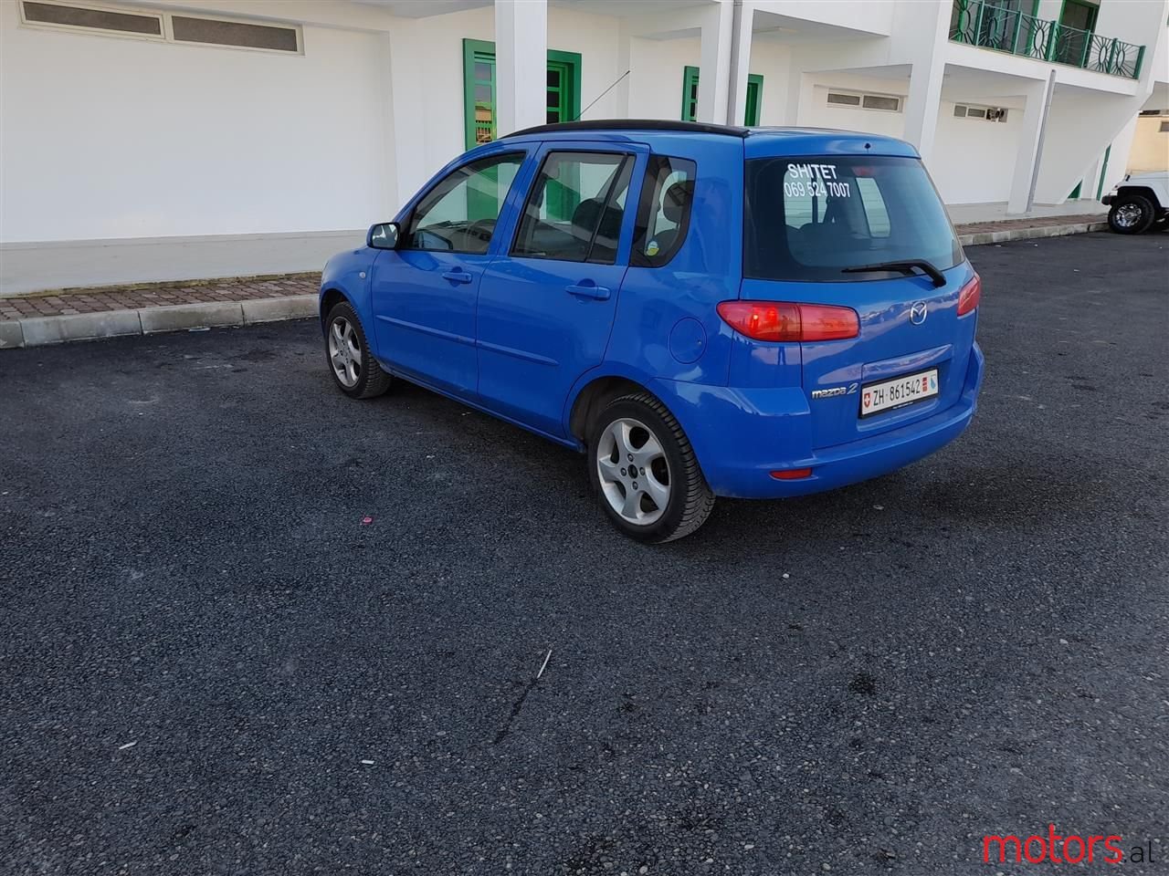 2004' Mazda 2 photo #3