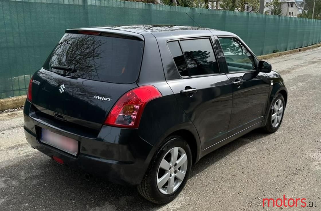 2009' Suzuki Swift photo #5