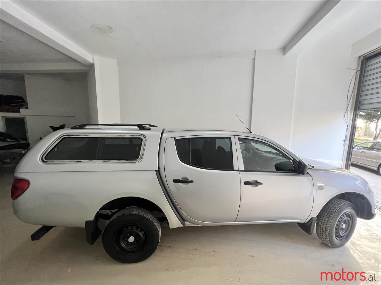 2010' Mitsubishi L200 photo #6