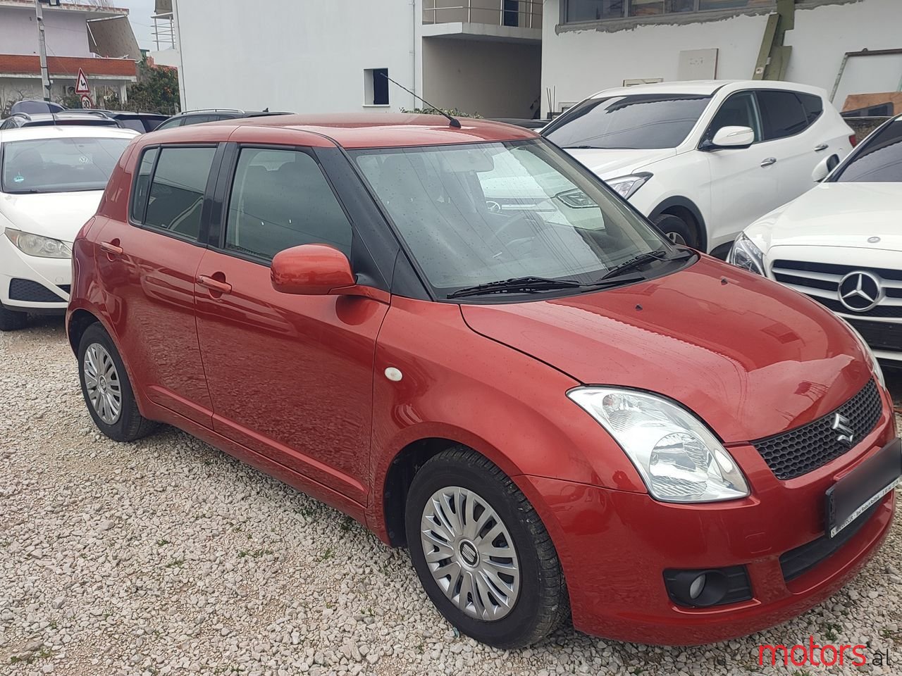 2009' Suzuki Swift photo #3