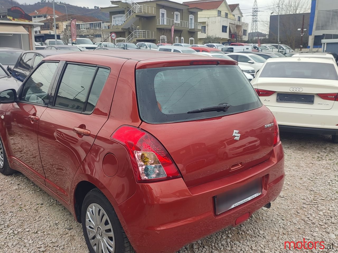 2009' Suzuki Swift photo #4