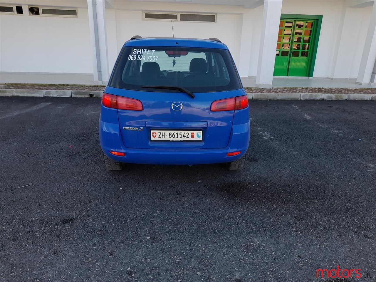 2004' Mazda 2 photo #2