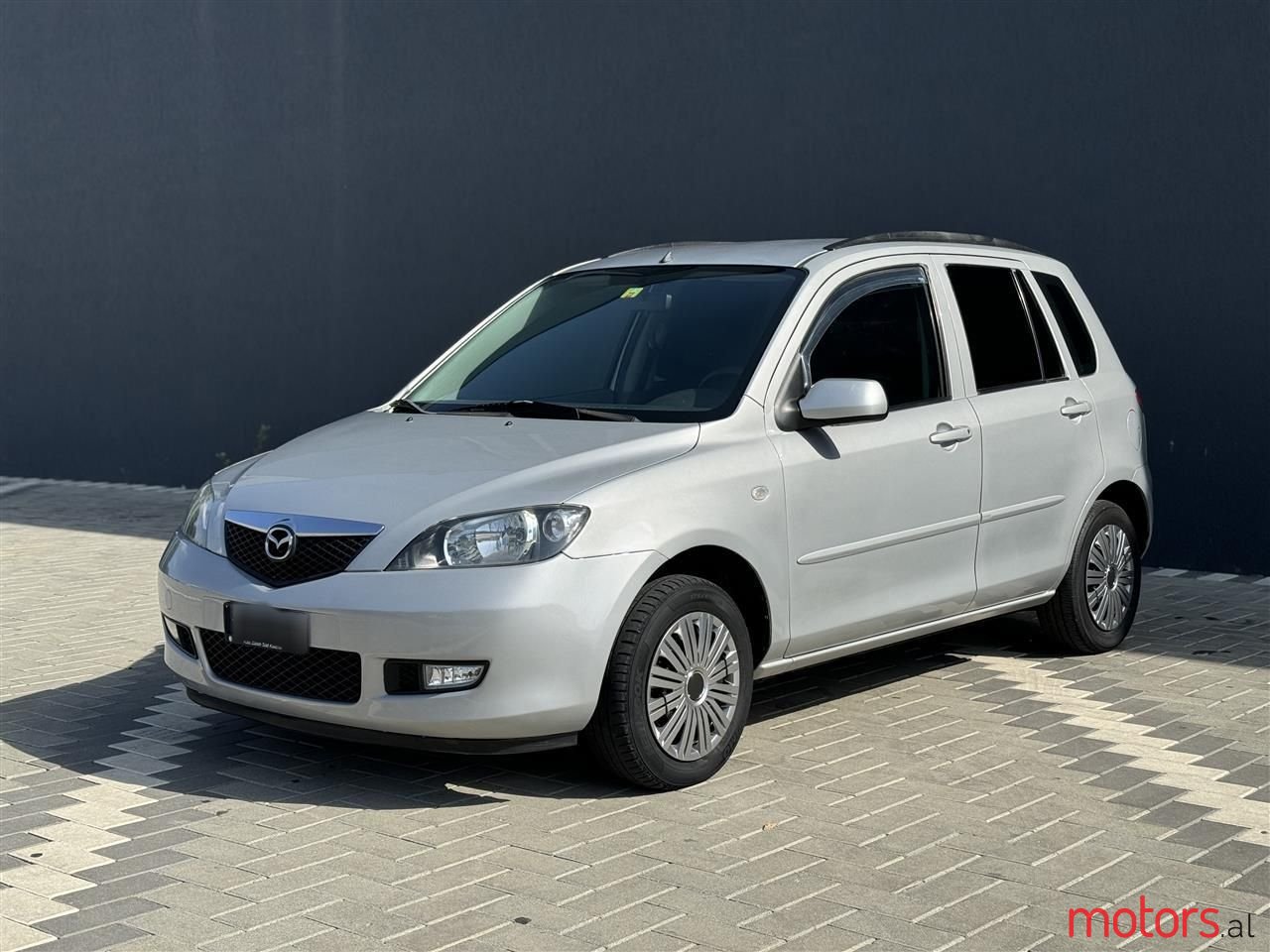 2004' Mazda 2 photo #1