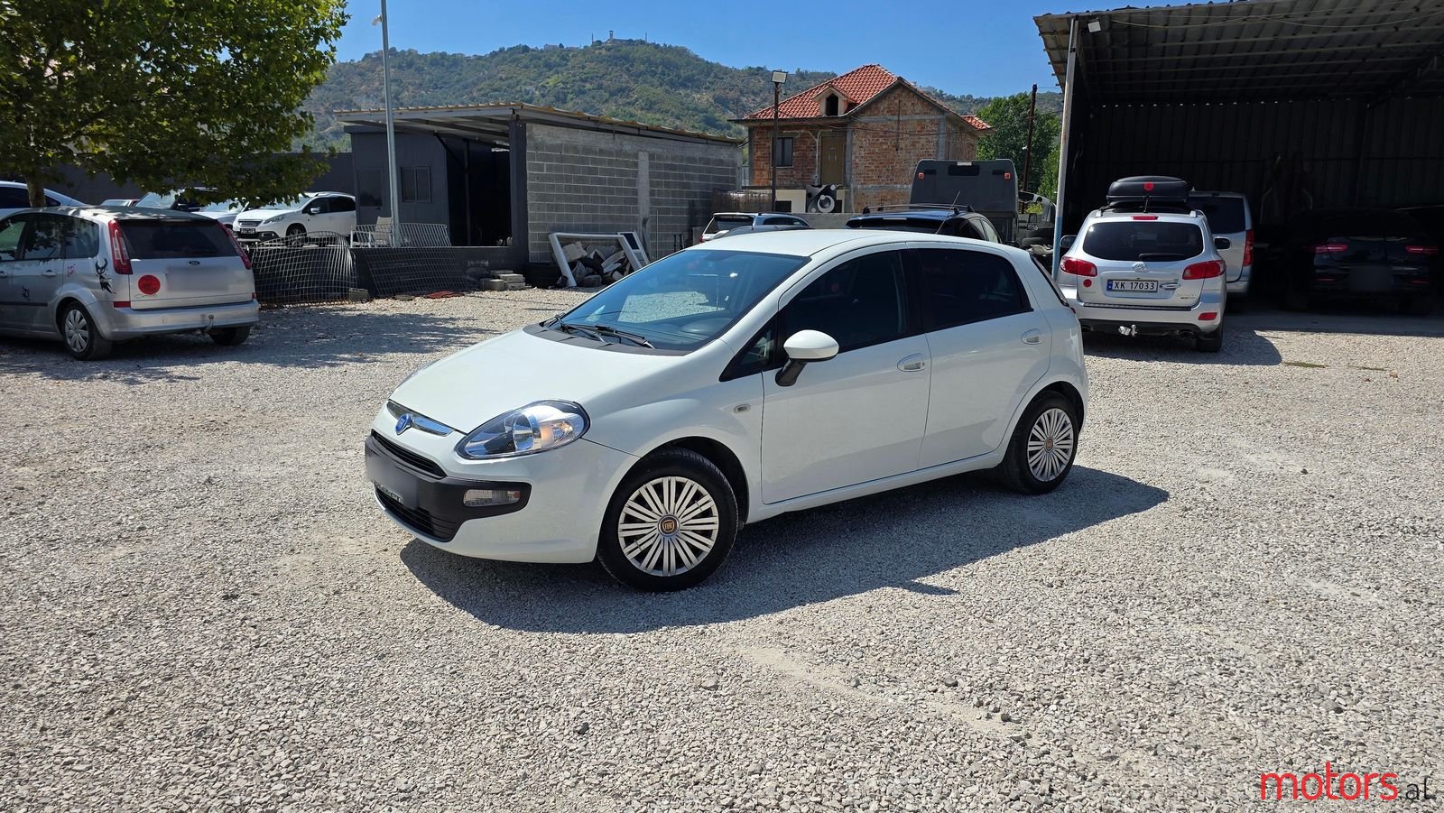 2012' Fiat Grande Punto photo #1