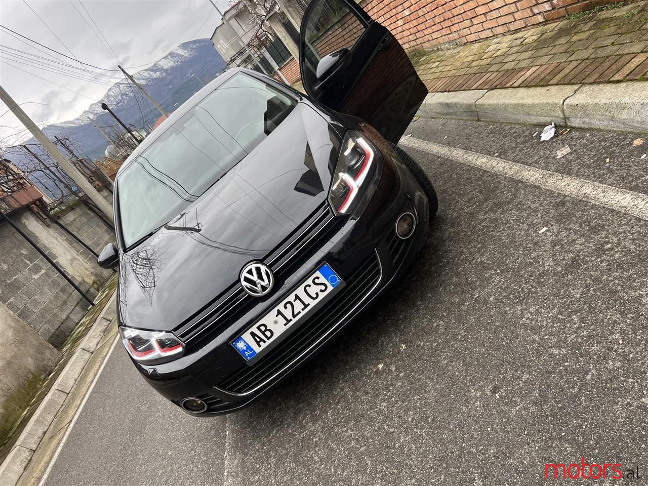 2013' Volkswagen Golf photo #1