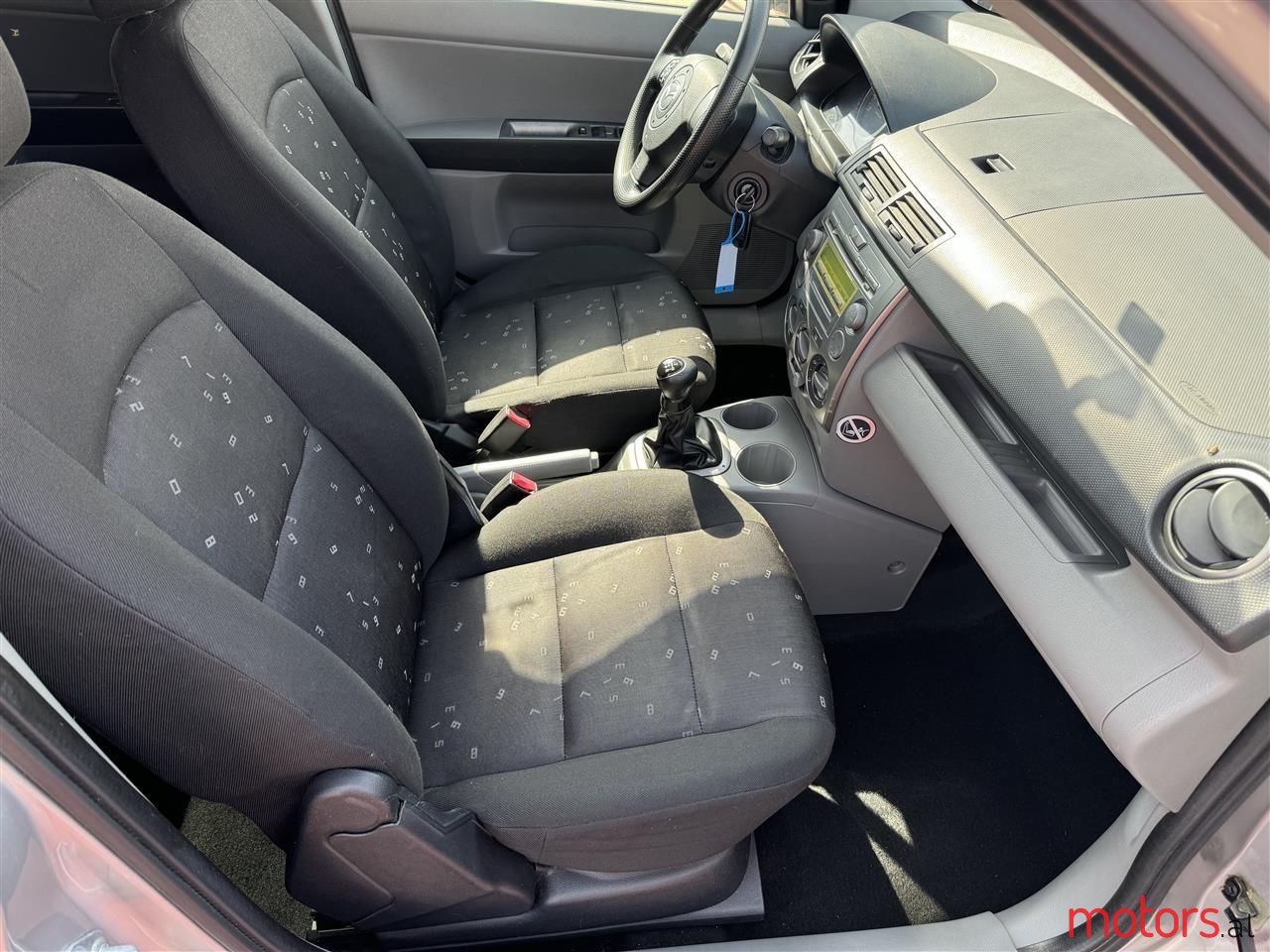 2004' Mazda 2 photo #5