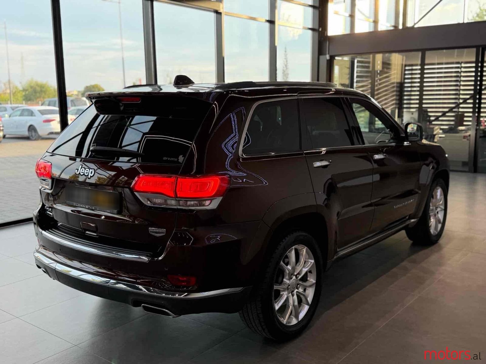 2014' Jeep Grand Cherokee photo #3