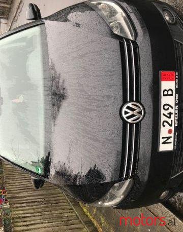 2012' Volkswagen Touran photo #1