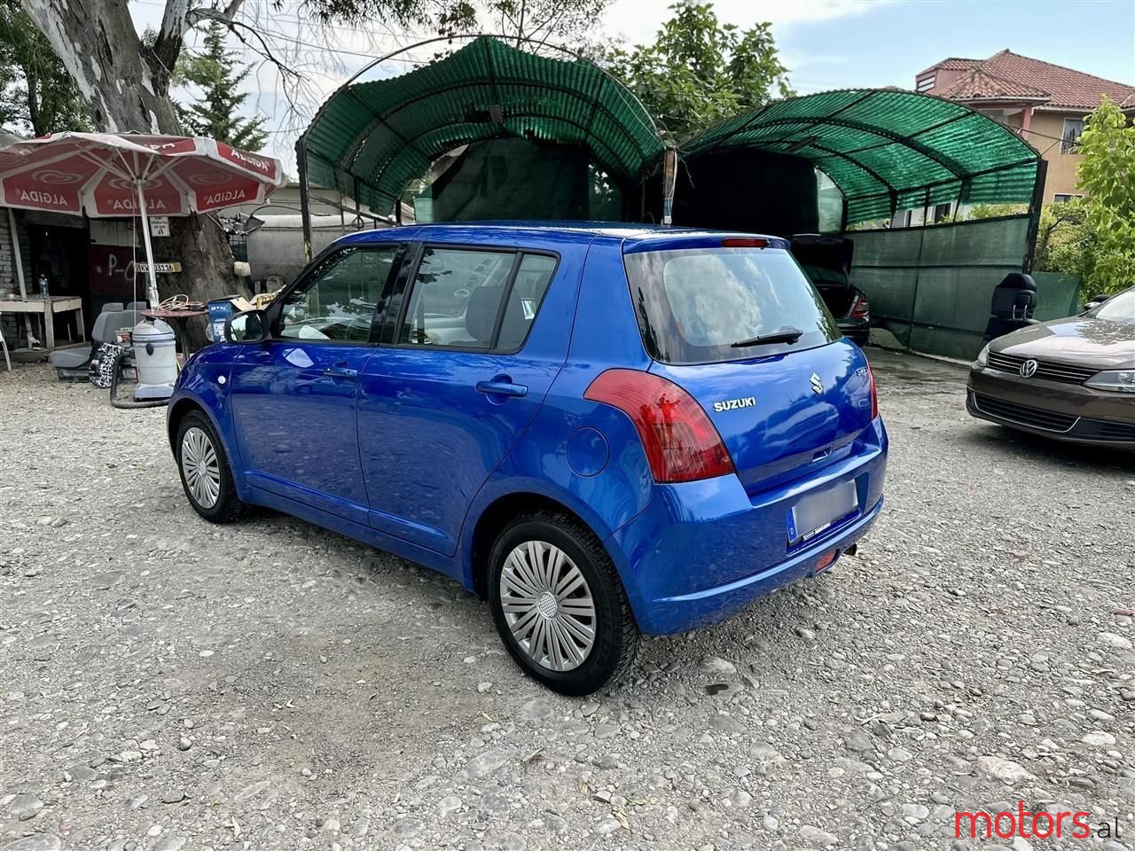 2006' Suzuki Swift photo #3